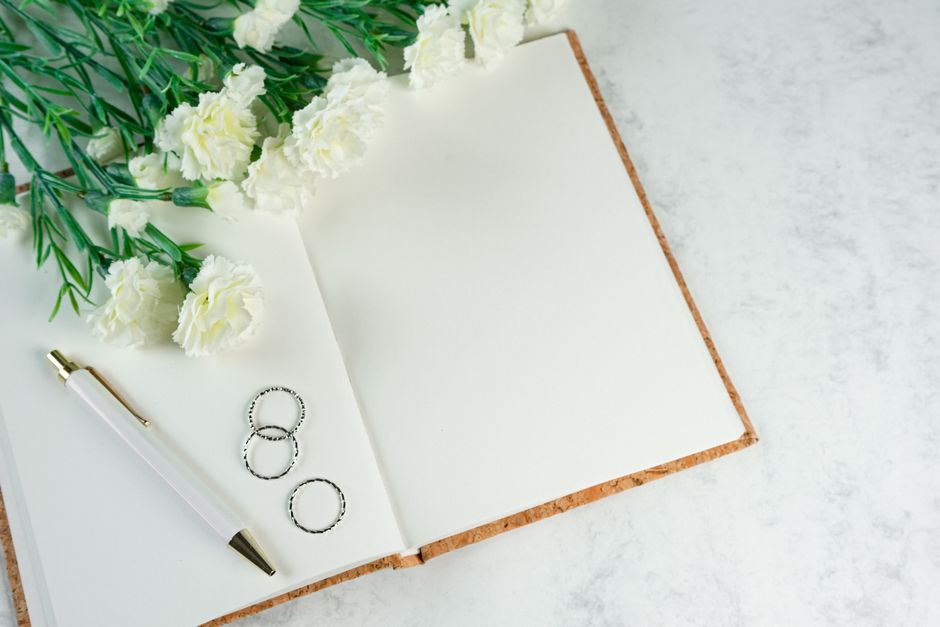 Dedicated wedding planner organizing details with a couple
