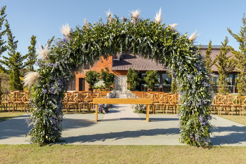 Beautiful outdoor wedding ceremony arch setup